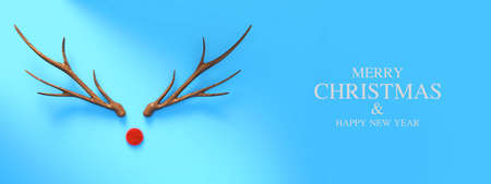 Antlers of a reindeer on a blue backdrop for the Christmas season.,merry christmas and happy new year,3d renderingの写真素材