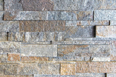 The stone wall is cut from small slabs to form a horizontal,Interior decoration materials,gray stone...