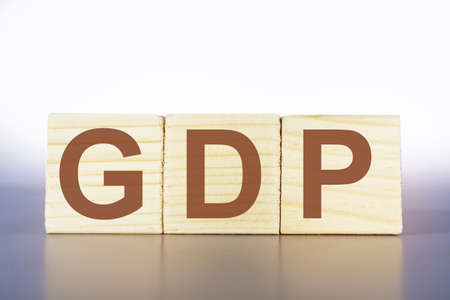 GDP letters on a wooden box,business and finance,gross domestic product