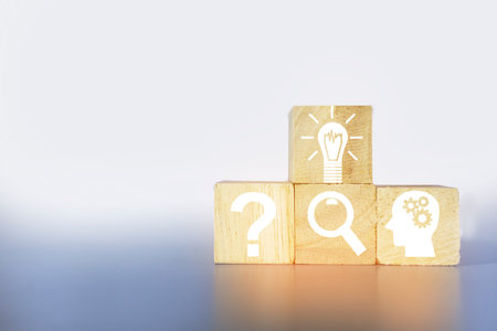 Doubt looking for answers icon on wooden box light gray backgroundの写真素材