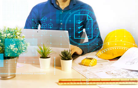 Engineers sit and work on building design and system work.,construction work safety,construction...