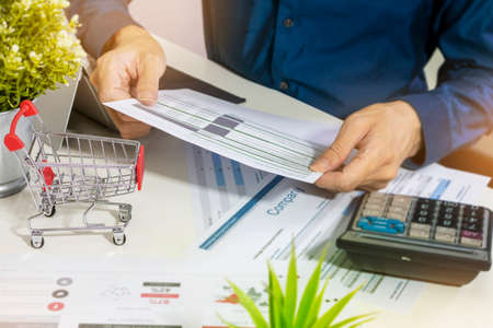 Business owners monitor operating results, profits and losses.の写真素材