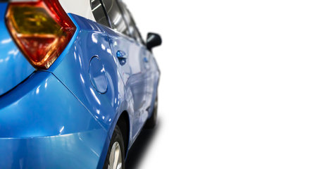 a four-seater automobile in blue on a white backdrop, isolatedの写真素材