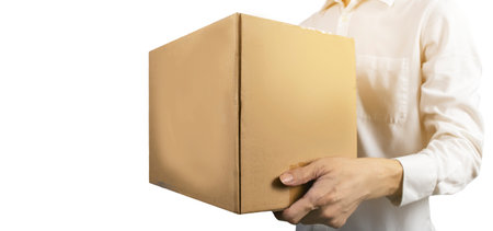 Shipping worker holds cargo boxes on white background.の写真素材