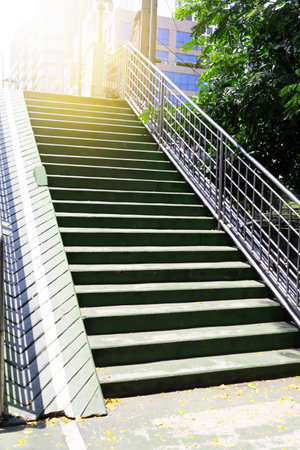 Green staircase on a clear day