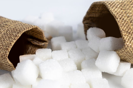 A sack of sugar on a white background Sugar industry business