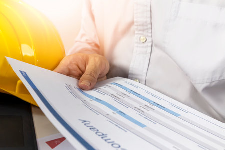 Engineers review project documentation and management.の写真素材