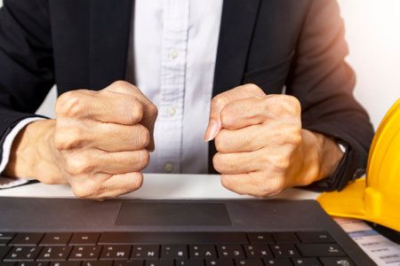 Executives are frustrated and dissatisfied with the work and the plans are very slow.の写真素材