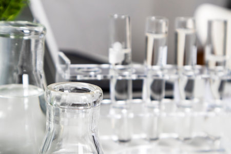 Bottles and transparent dishes are used in scientific and medical experiments, the use of chemicals creates medical research.の写真素材