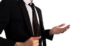 Businessman in black suit standing showing confidence in business and vision for workの写真素材