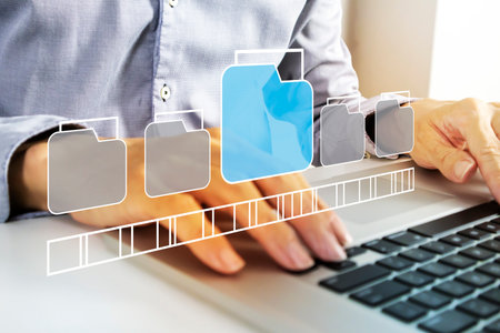 Business concept of opening document files and selecting, organizing and separating business documents in an orderly manner according to the business structure.の写真素材