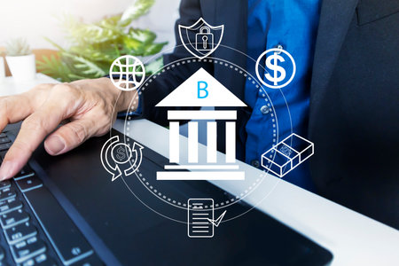 Businessman brings business plan to borrow money from bank, presents information for financial approvalBank provides financial loan and financial transaction, transfer money, exchange moneyの写真素材