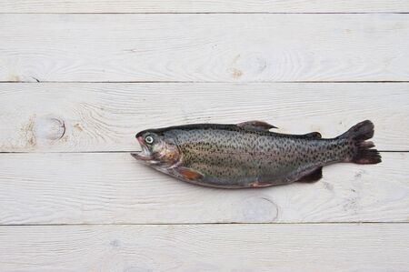 Trout set on a white board, view from aboveの写真素材