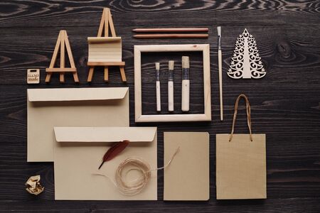 Envelope for holiday message on wooden background