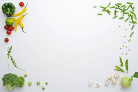 Top view of fresh organic vegetables and healthy food products Isolated on white background.