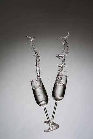Champagne splash black and white. holiday greeting, toast.の写真素材