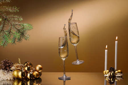 Champagne splash, new year card, in a festive atmosphere.の写真素材