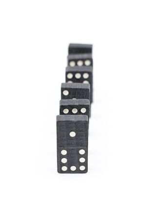 Black domino in a rowの写真素材