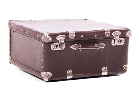 Old leather suitcase isolated on white background