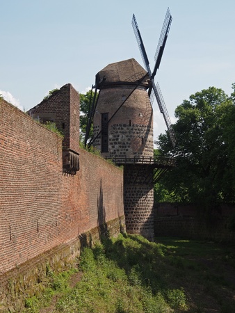 Ancient wind mill in a city wallのeditorial素材