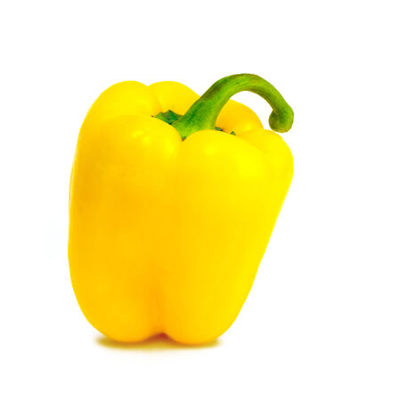 Ripe juicy yellow pepper isolated on white backgroundの写真素材