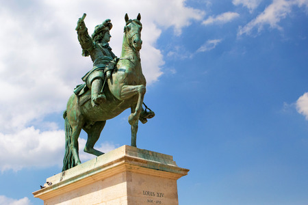 Statue of Louis XIV in Palace of Versaillesの写真素材