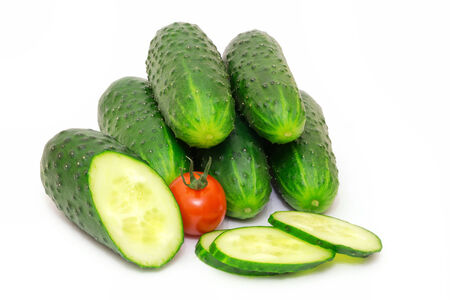 Ripe juicy cucumbers isolated on white backgroundの写真素材