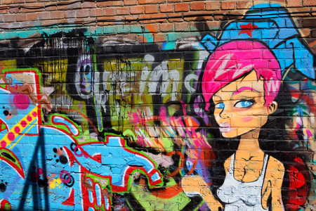 Russian girl graffiti made on a brick wallのeditorial素材