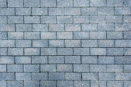 Texture of road surface made grey pave stonesの写真素材