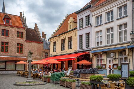 BRUGES, BELGIUM - CIRCA JUNE 2014: Typical street in Bruges in June 2014. This is famous marketplace of one of the most popular touristic destination in Belgiumのeditorial素材