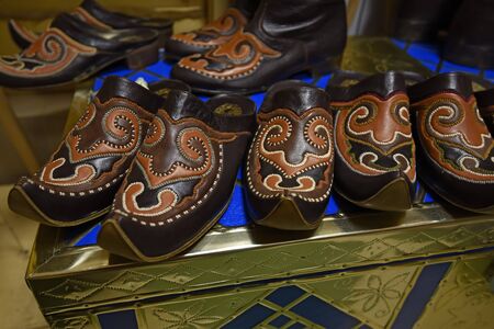 Colorful oriental ethnic shoes on flea marketの写真素材