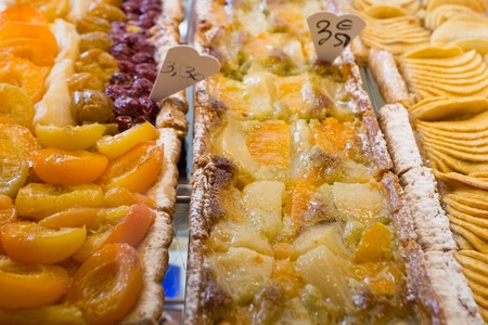 Variety of fruit pies in confectionary shop