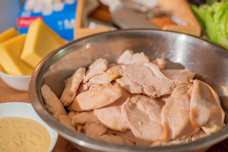 Raw chicken breast fillets on metallic plateの写真素材