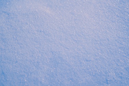Blue snow texture background taken in the eveningの写真素材