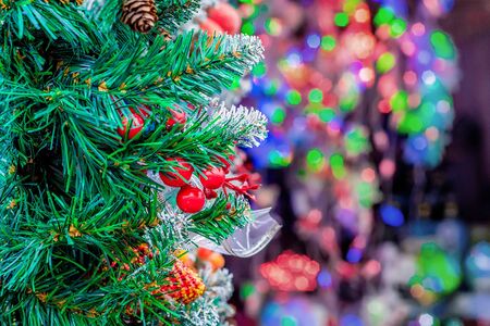Decorated Christmas tree with various gifts. Christmas and New Year celebration. Holiday Christmas scene.の写真素材