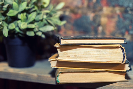 Old books on shelfの写真素材