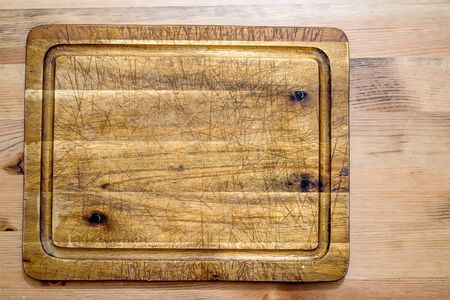 Old wooden cutting boardの写真素材