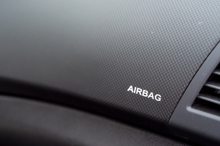 Close up of airbag symbol in car interiorの写真素材