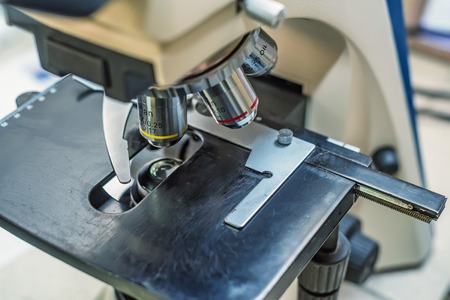 Closeup of objective lens microscope in laboratoryの写真素材