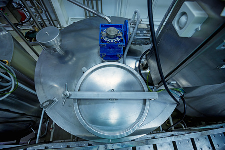 Equipment at dairy plantの写真素材