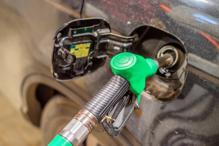 Refilling the car with fuelの写真素材