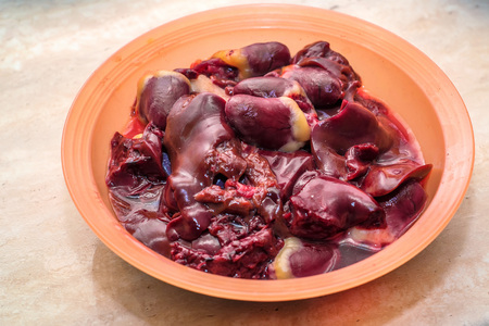 Chicken offals in bowlの写真素材