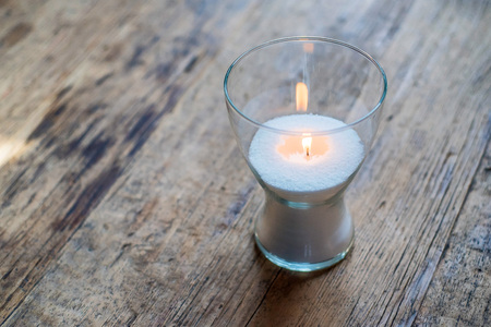 Burning decorative candleの写真素材