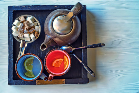 Tea set on white wooden tableの写真素材