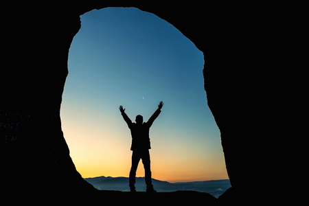 Male traveler in mountains at nightの写真素材