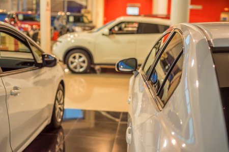 New cars at dealer showroomの写真素材