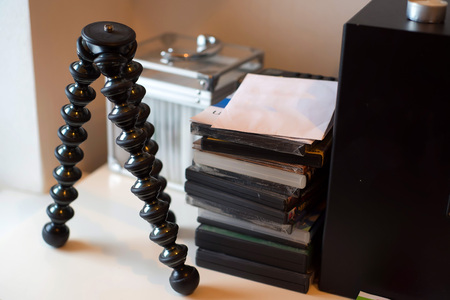 Mini tripod on tableの写真素材