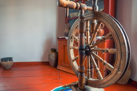 Old wooden spinning wheel