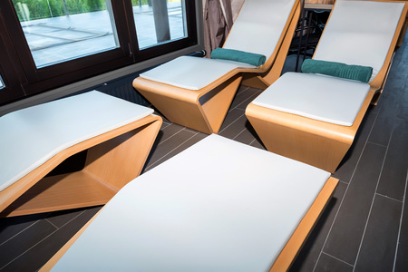 Deck chairs near the swimming poolの写真素材