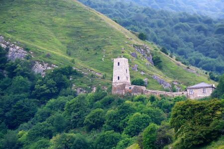 Beautiful stone homestead in mountains in Ossetiaの写真素材
